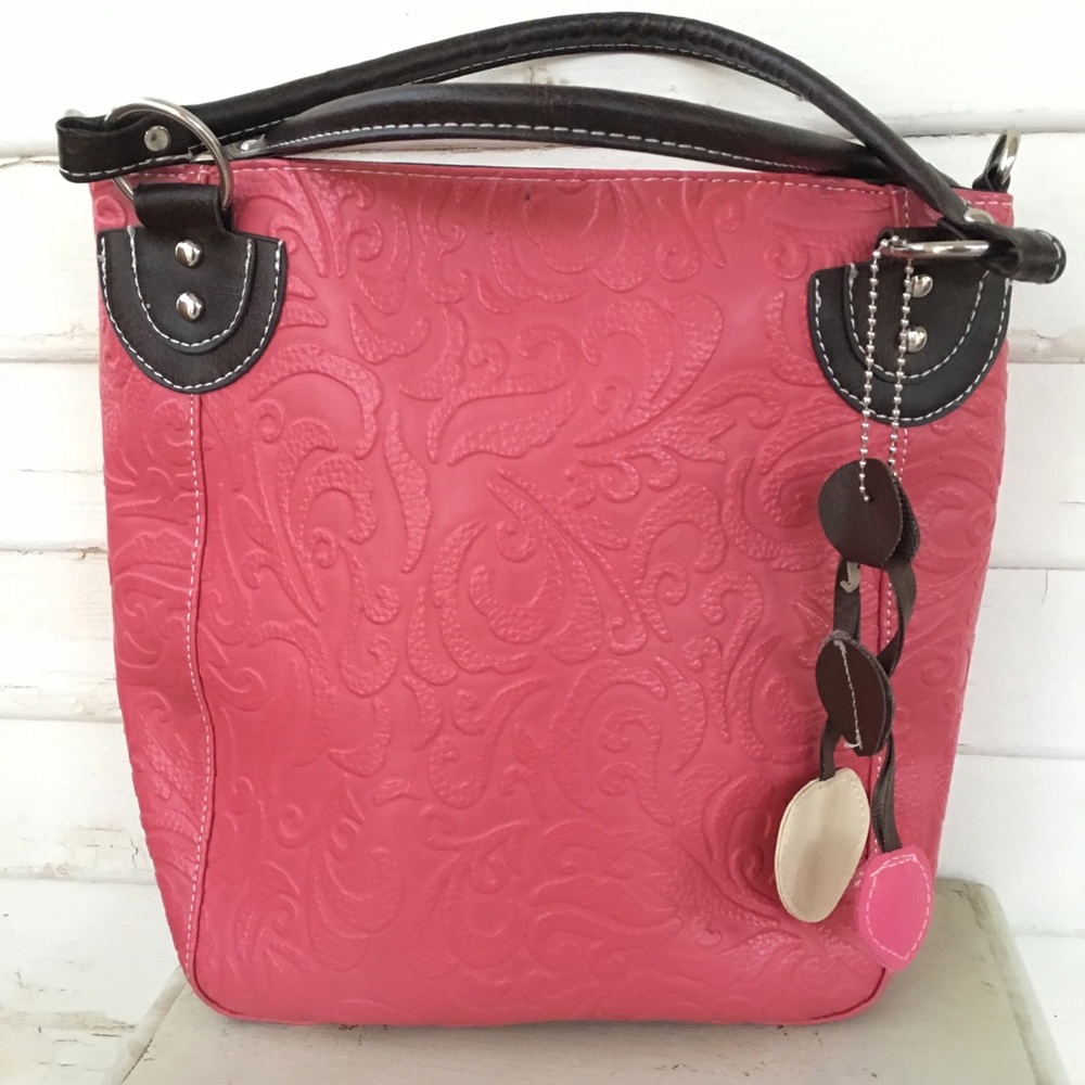 Pink Tote with embossed design. 11x10x4” 6” drop